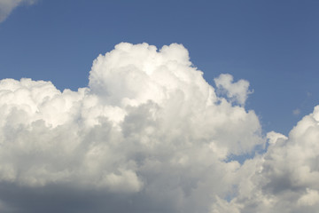 Naklejka na ściany i meble puffy clouds on blue sky 18