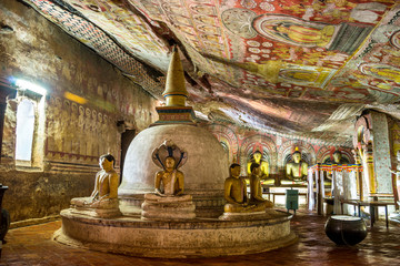 Cave in Dambulla, Sri Lanka. Cave temple has five caves under a vast overhanging rock and dates...