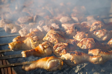 Cooking meat on the fire.