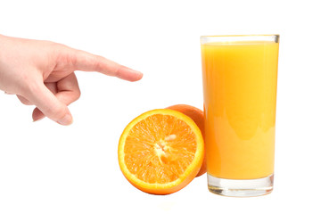 Human hand gesturing with fresh orange and full glass of orange juice taken on white background