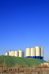 Concrete mixing tower. Concept of on-site construction facility.