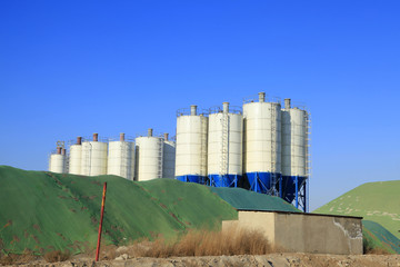 Concrete mixing tower. Concept of on-site construction facility.
