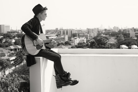 On the rooftop with guitar