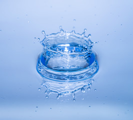 Abstract blue circle water drop ripple. Liquid texture backgroun