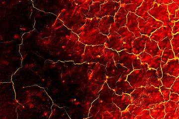 heat red cracked ground texture after eruption volcano