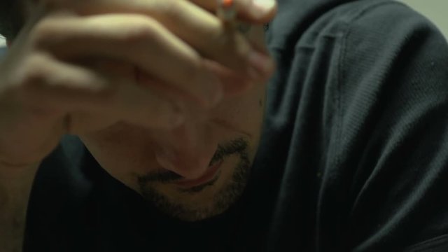 SUPER 35MM CAMERA - Man smoking a cigarette
