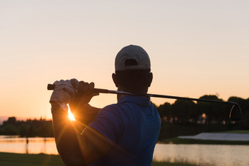 golfer hitting long shot