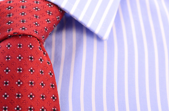 Red Mens Tie and Blue stripe shirt.
