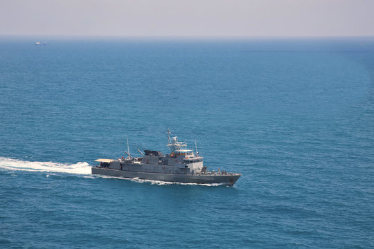 Military navy ships in a sea bay