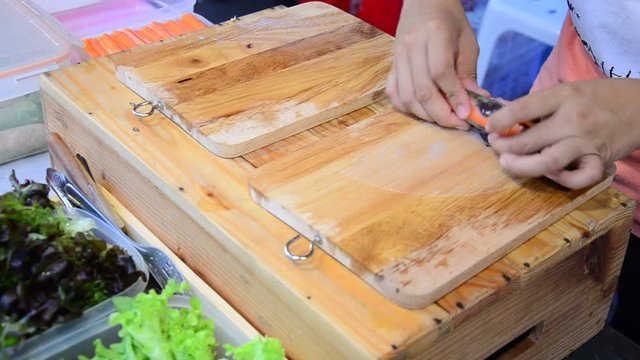 Thai people cooking fresh vegetable organic salad rice sheet rolls or spring roll recipe for sale