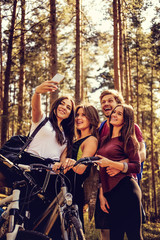 Group of adults relaxing in a park.
