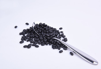 Black soybeans and spoon 