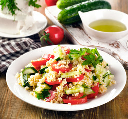 Tabbouleh salad with bulgur, parsley and vegetables