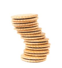 Twisted stack of cookies isolated over the white background