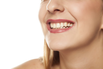 Obraz premium toothy smile and lips with lipstick