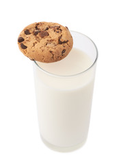 Glass of milk and cookie isolated over the white background