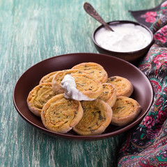 Indian potato rolls with yogurt sauce