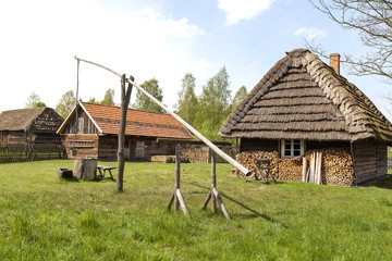 Fototapeta na wymiar old well crane in open-air museum, Kolbuszowa, Poland
