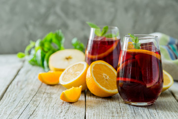 Sangria and ingredients in glasses