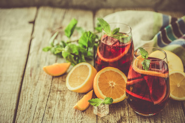 Sangria and ingredients in glasses