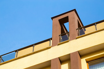 Open-air balcony and covered portico