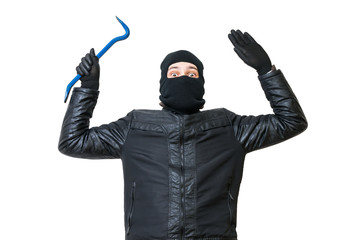 Burglar or thief is putting hands up. Arrested robber is giving up. Isolated on white background.