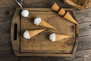 creamy vanilla ice cream in preparation with rustic background a