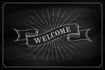 Set of old vintage ribbon banners with word Welcome in engraving style on a black chalkboard background and texture. Hand drawn design element. Vector Illustration © foxysgraphic
