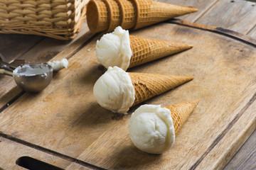 creamy vanilla ice cream in preparation with rustic background a