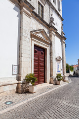 Close up on the Renaissance portal of the Santo Estevao Church, also known as Santissimo Milagre Sanctuary. Renaissance architecture. Santarem, Portugal.