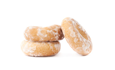 Stack of small cakes with hole isolated over the white background