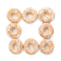 Pile of small cakes with hole isolated over the white background