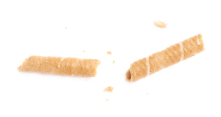 Broken into pieces wafel sticks isolated over the white background