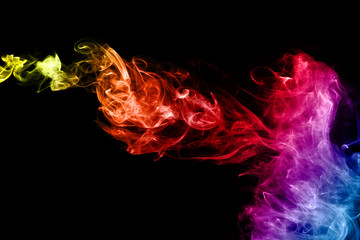 Colored abstract smoke, isolated on black background. Photo. Neon.