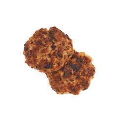 Couple of small hand made cutlets isolated over white background