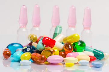 ampoule and pills shot