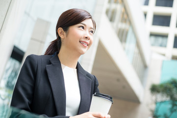 Young Businesswoman enjoy her coffee at outdoor