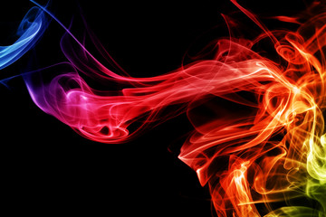 Colored abstract smoke, isolated on black background. Photo. Neon.
