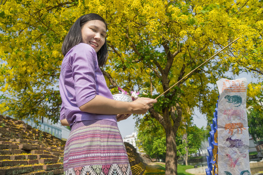 Young Thai girl at temple in songkran festival ,Chiangmai Thailand.