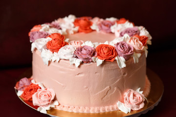 Birthday cake with red roses.