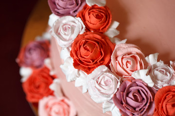 Birthday cake with red roses.