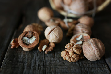 Fototapeta na wymiar walnuts, whole and peeled