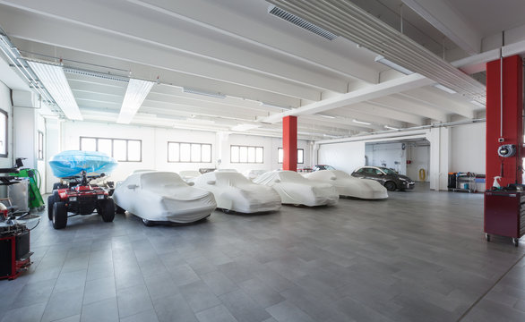 Modern garage interior, cars exposition