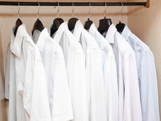 Men's shirts on hangers