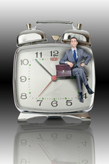 Business concept with businessman and clock