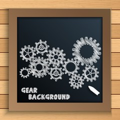 Cogs and gears mechanism written by chalk on blackboard