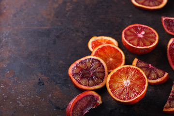 blood orange slices,on a black background.Copy space.selective focus.