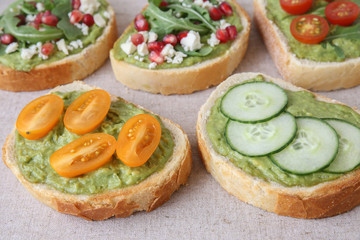Mixed green sourdough open face sandwiches toast,toning