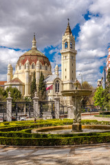 View at the church San Benito and San Manuel from Retiro park in Madrid