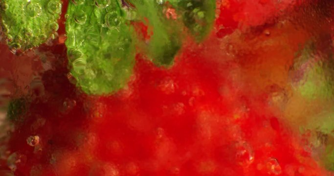 Fresh Strawberries underwater with bubbles